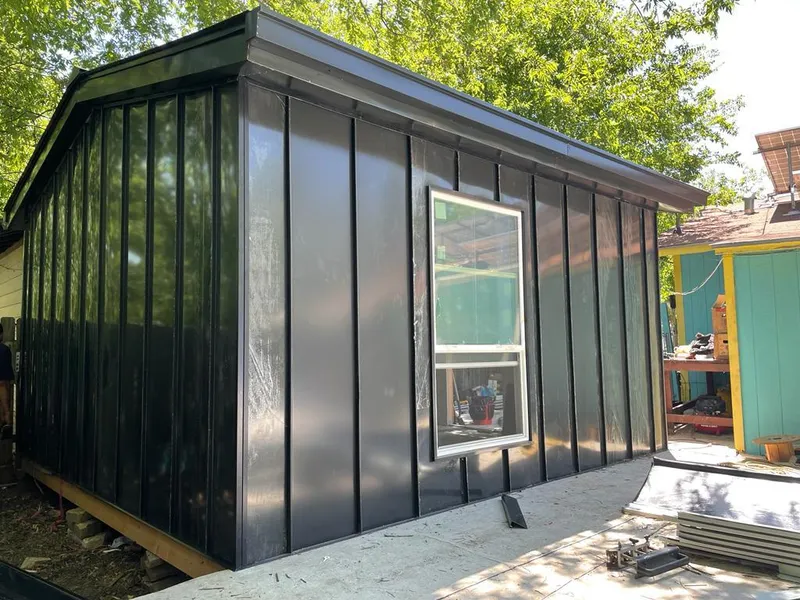 Black standing seam metal wall panels for Roof Inspection in Sullivan