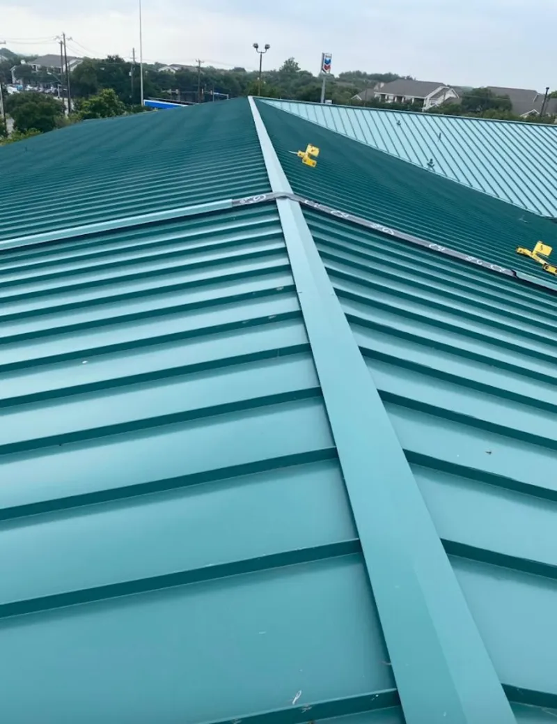 Green commercial metal roof ridge and valley for Metal Roof Repair in Sullivan