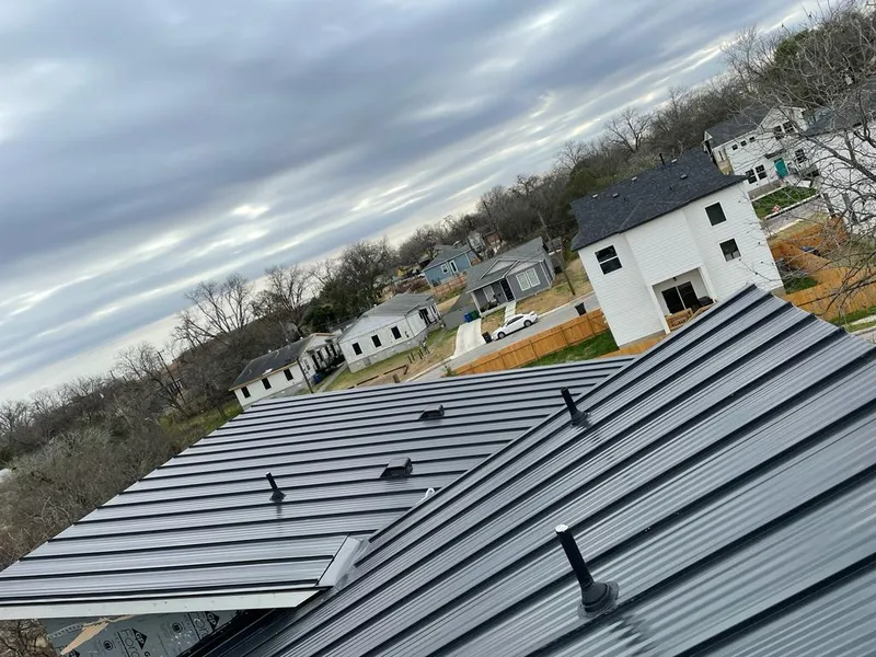 Standing seam metal roof panels with vents for Skylight Repair in Sullivan